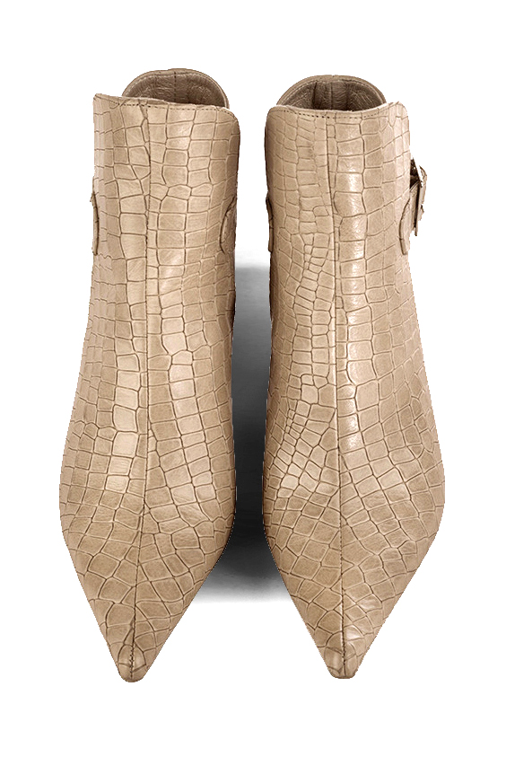 Tan beige women's ankle boots with buckles at the back. Pointed toe. High slim heel. Top view - Florence KOOIJMAN